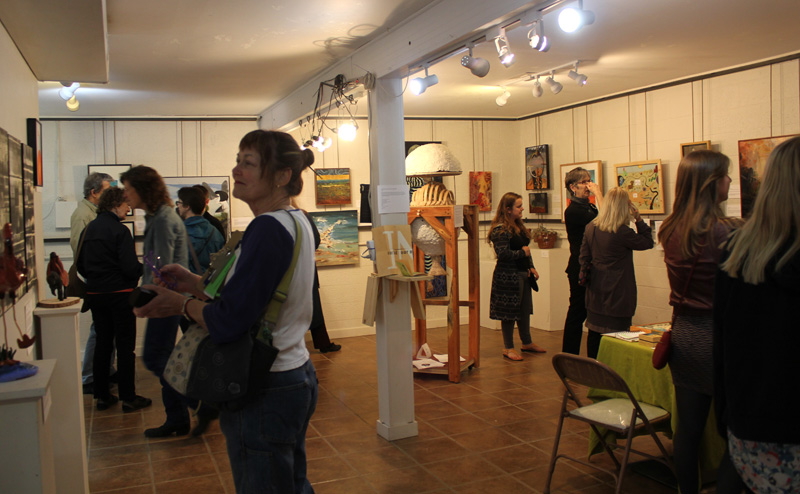 The exhibit opening reception for Heating Up: Artists Respond to Climate Change .
