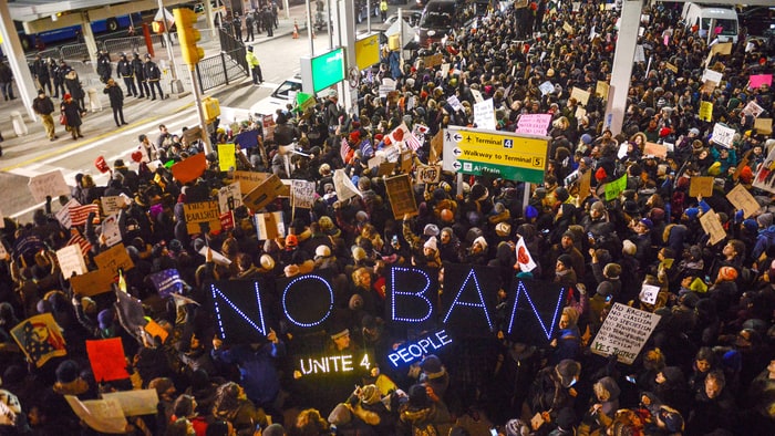 Protestors at JFK. (Photo: Stephanie Keith, Getty Images)
