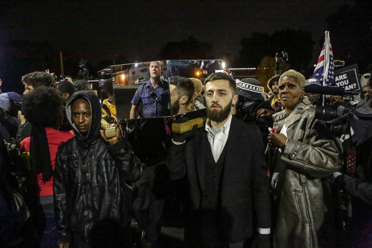 Marching with The Mirror Casket.