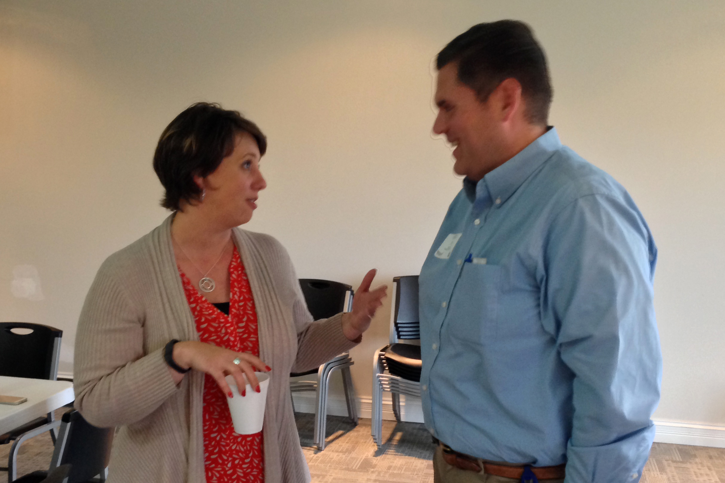  INARF CEO Kim Opsahl chats with State Rep. Ed Clere 