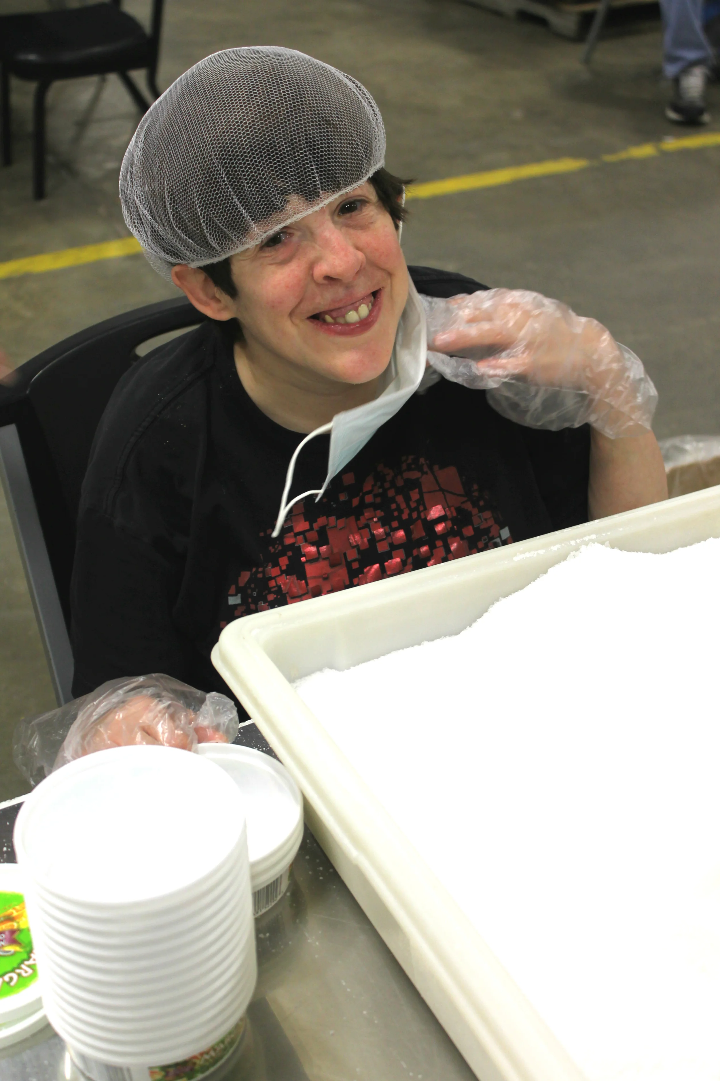 Deanna works on packaging American Beverage Marketers margarita salt.
