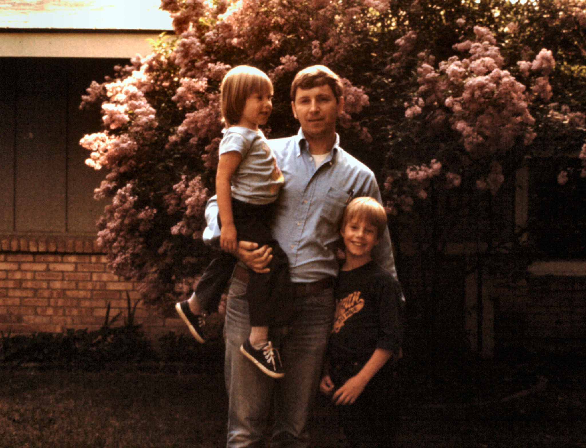  Darrel holding his daughter Beth and son, Mark, at his side. Midland, MI 1980. 