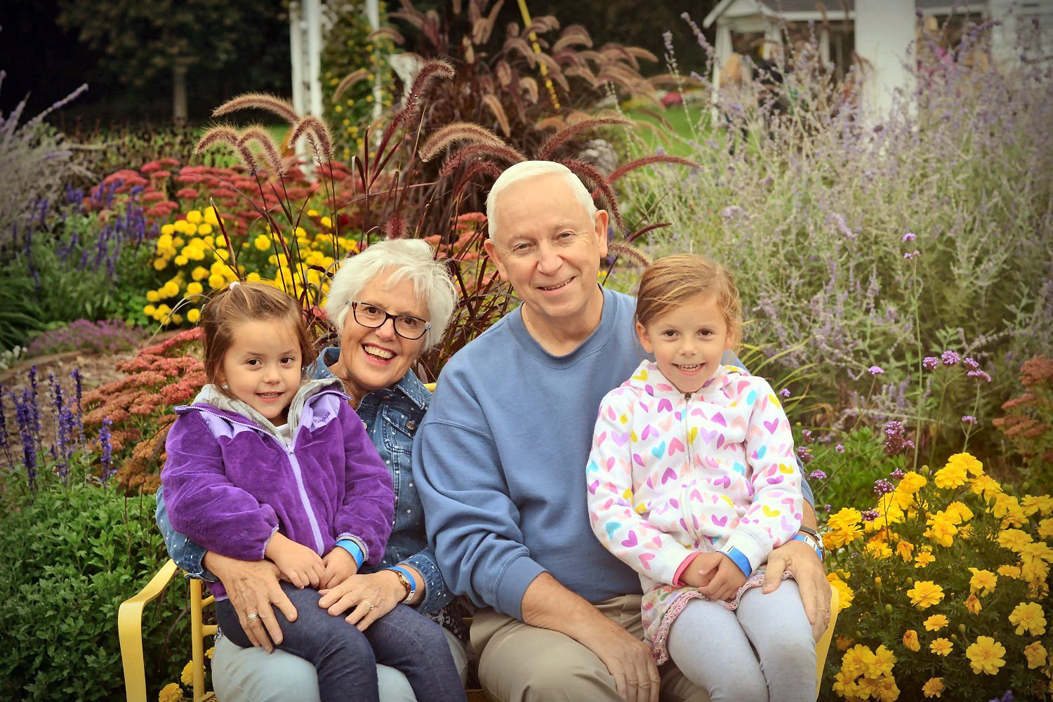  Darrel and Jane with two of their three grand-daughters, Francine and Vivian. 