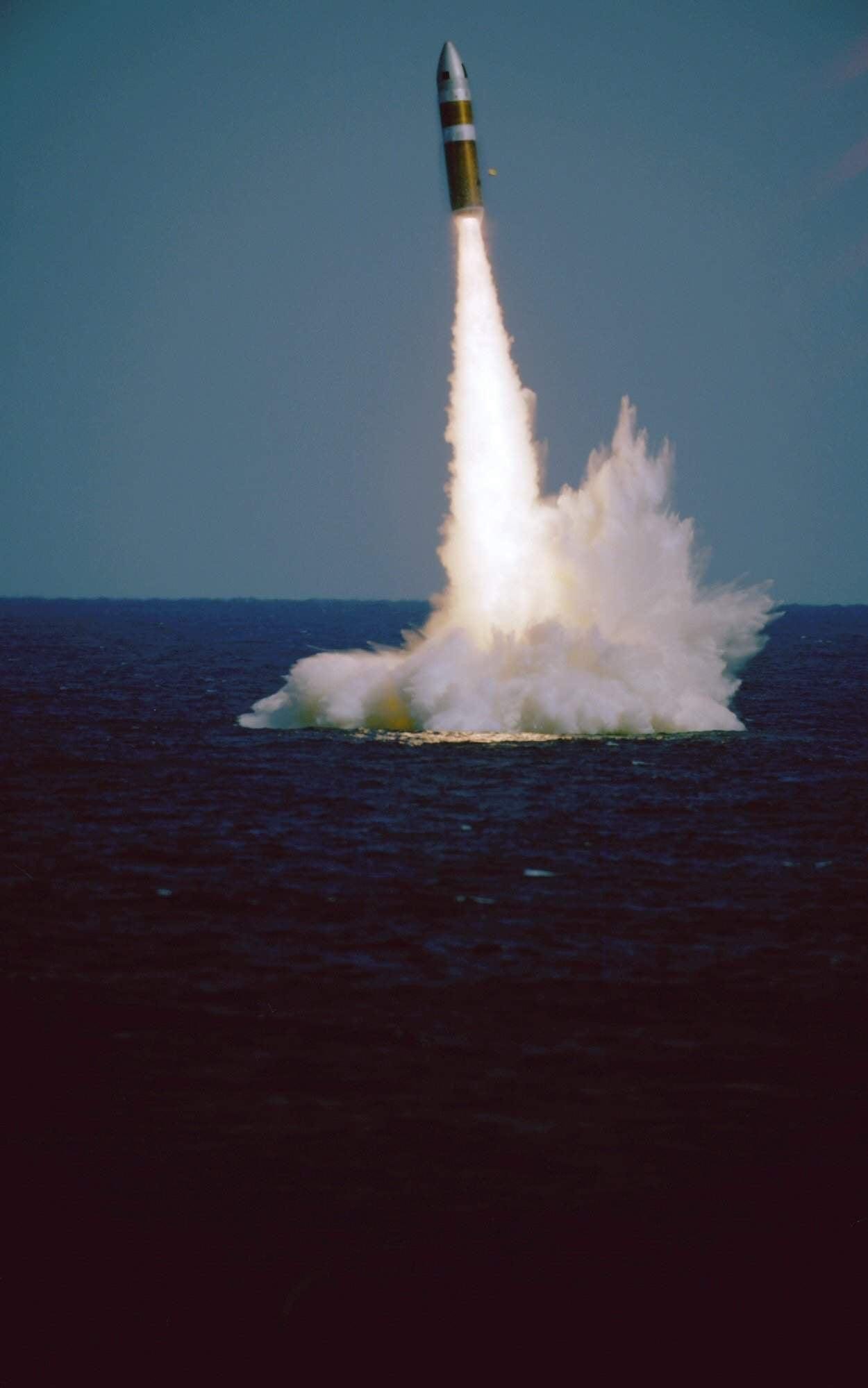  Missle launch testing from the USS Daniel Boone to check telemetry and accuracy. They shot/tested 4 missiles (without warheads) off the coast of Africa toward Cape Canaveral, FL. Once the hatch is open, steam explosions in the tube push the 30-foot 