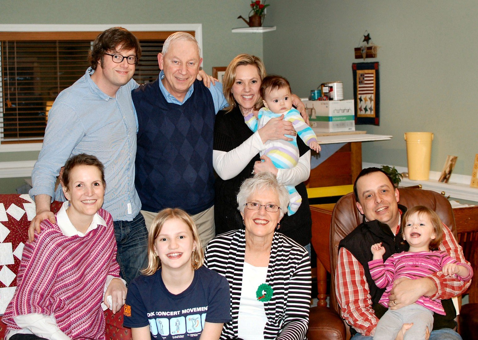  Darrel’s family. 2013. Son Mark in upper left with his wife, Natasha, 9 months before she passed away from cancer. Natasha’s daughter Zoe next to her. Beth, Darrels daughter holding Francine and Beth’s husband Jamey, holding Vivian. 