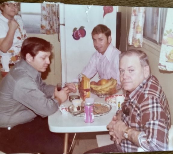  Mom, Florence, Jim, Darrel and their Dad, Earl drinking a Tab and taking it all in. 1971. 