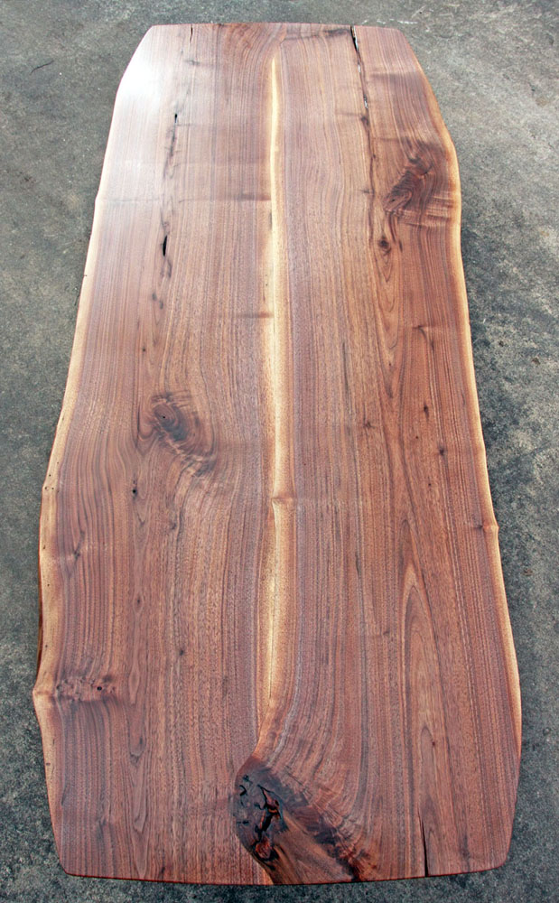 The completed center joint, joining the two slabs. A small band of sapwood was left to highlight the meandering seam that travels the length of the top.