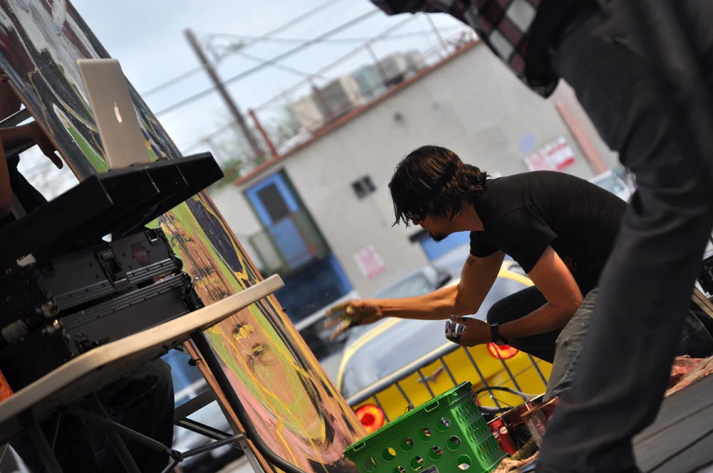 2013, April 7th: Deep Ellum Arts Festival. Dr Gorilla paints with Playdough. Photo by Nicole Rodriguez