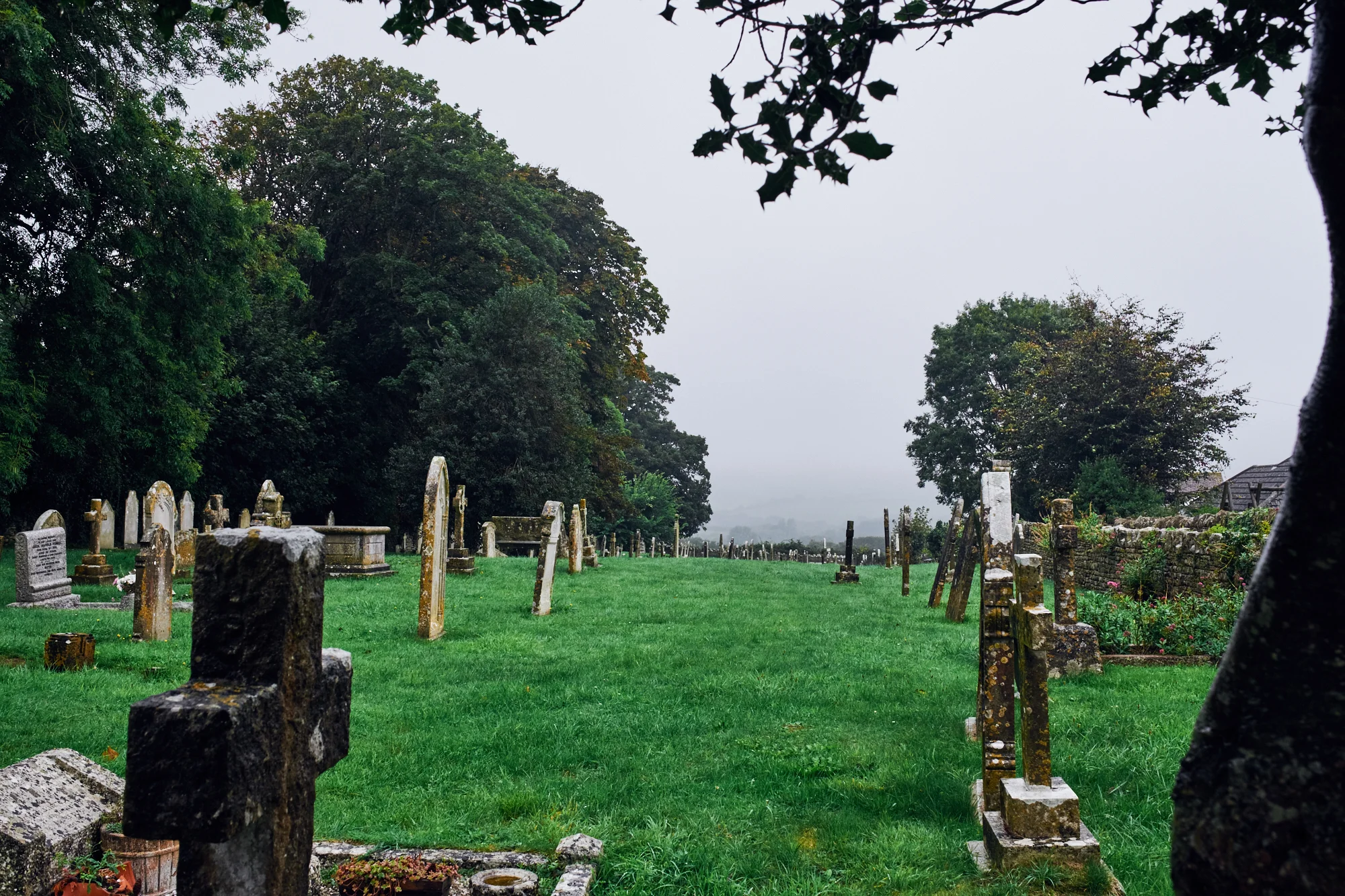 Graveyard in the rain, Langton Matravers - © Andrew Newson