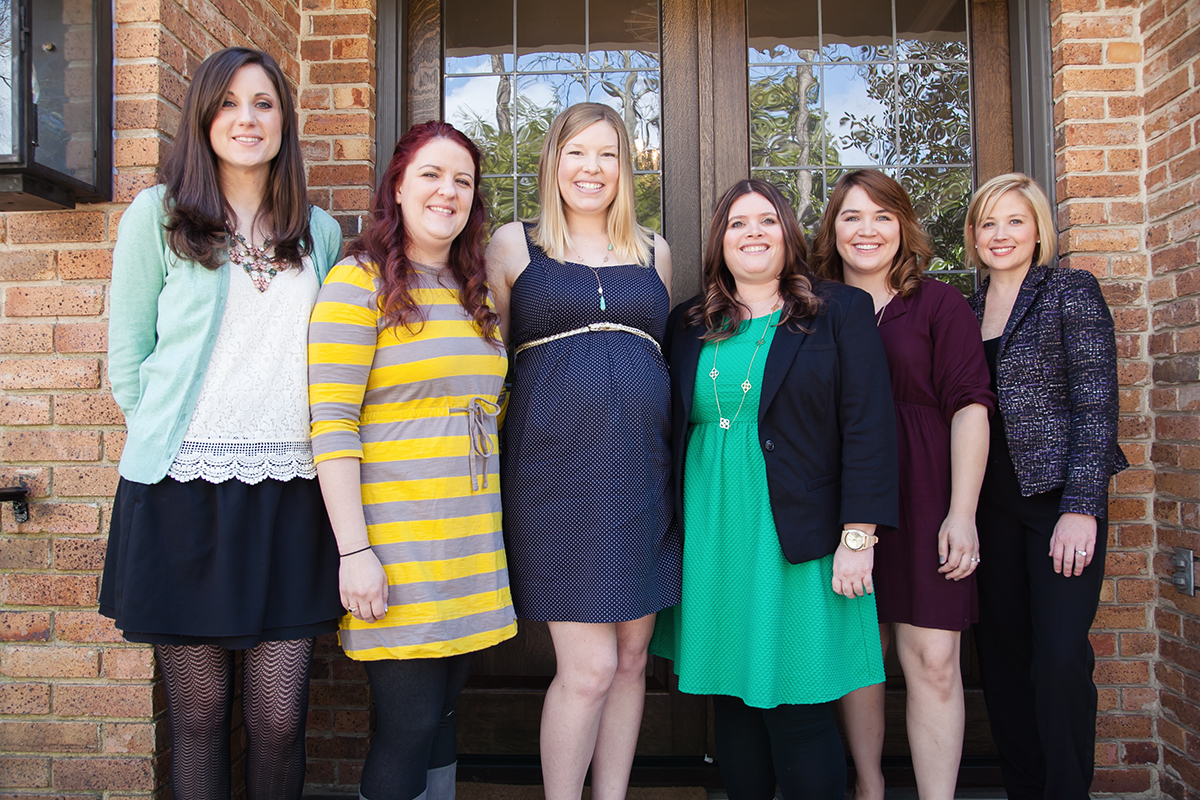 All of the shower hostesses with guests of honor, Amy and London.