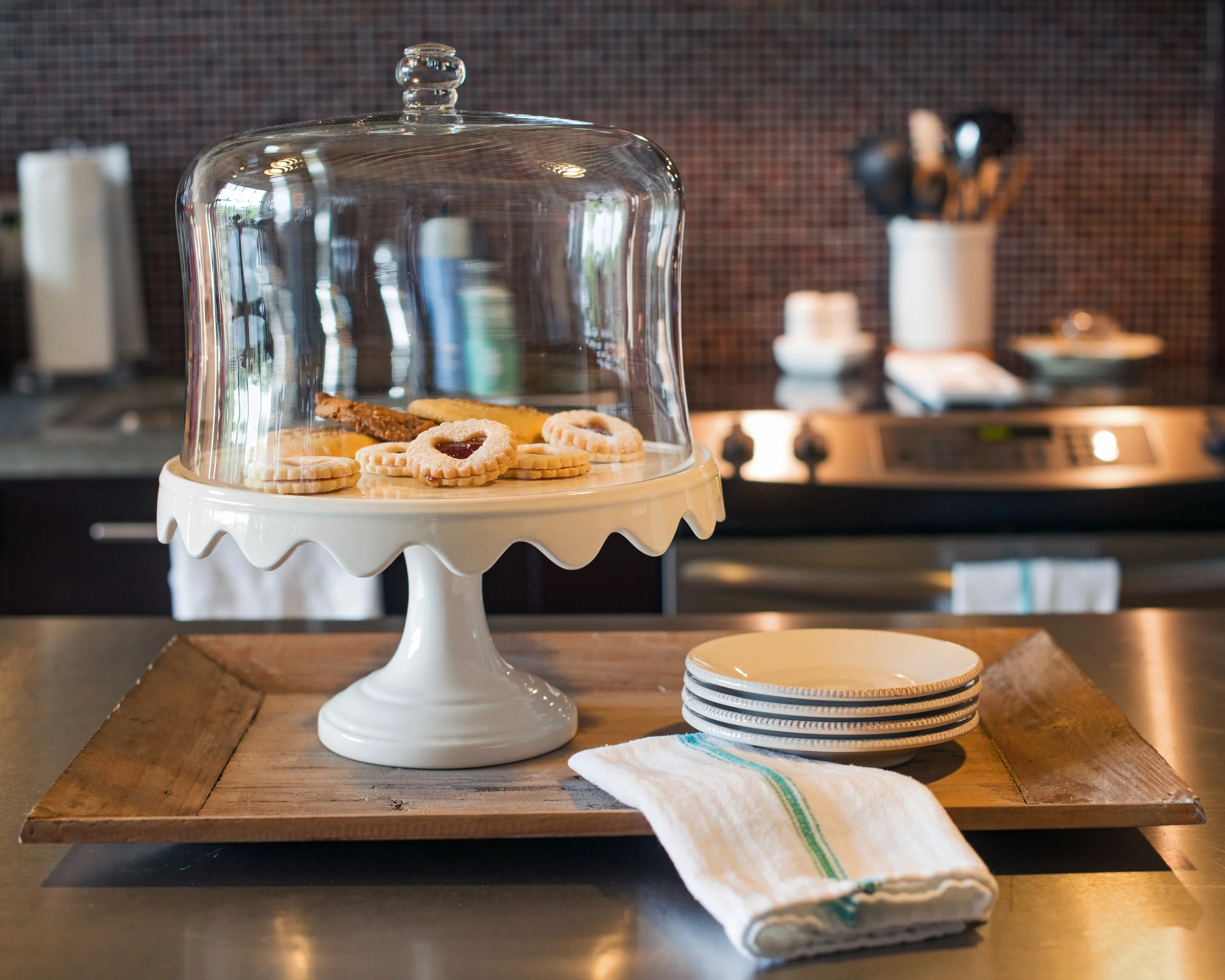 The first wedding gift we received was this beautiful cake stand. I found it in Macy's and "begged" Woody to register for it. Of course he said yes even if he didn't totally understand the value of a beautiful cake stand. He now loves eating homemade cookies that are often kept in it, and it is one of my favorite pieces in our home! Photo by Rachel Coffey