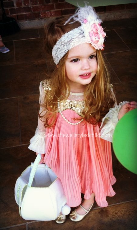 The simple inexpensive dress looks WAY more fancy with the Persnickety Mesh Shirt and Cuffs layered underneath! She's wearing one of my pearl necklaces and an Appelilly Couture headband I had made to match the dress along with simple gold ballet flats from Nordstrom. 
