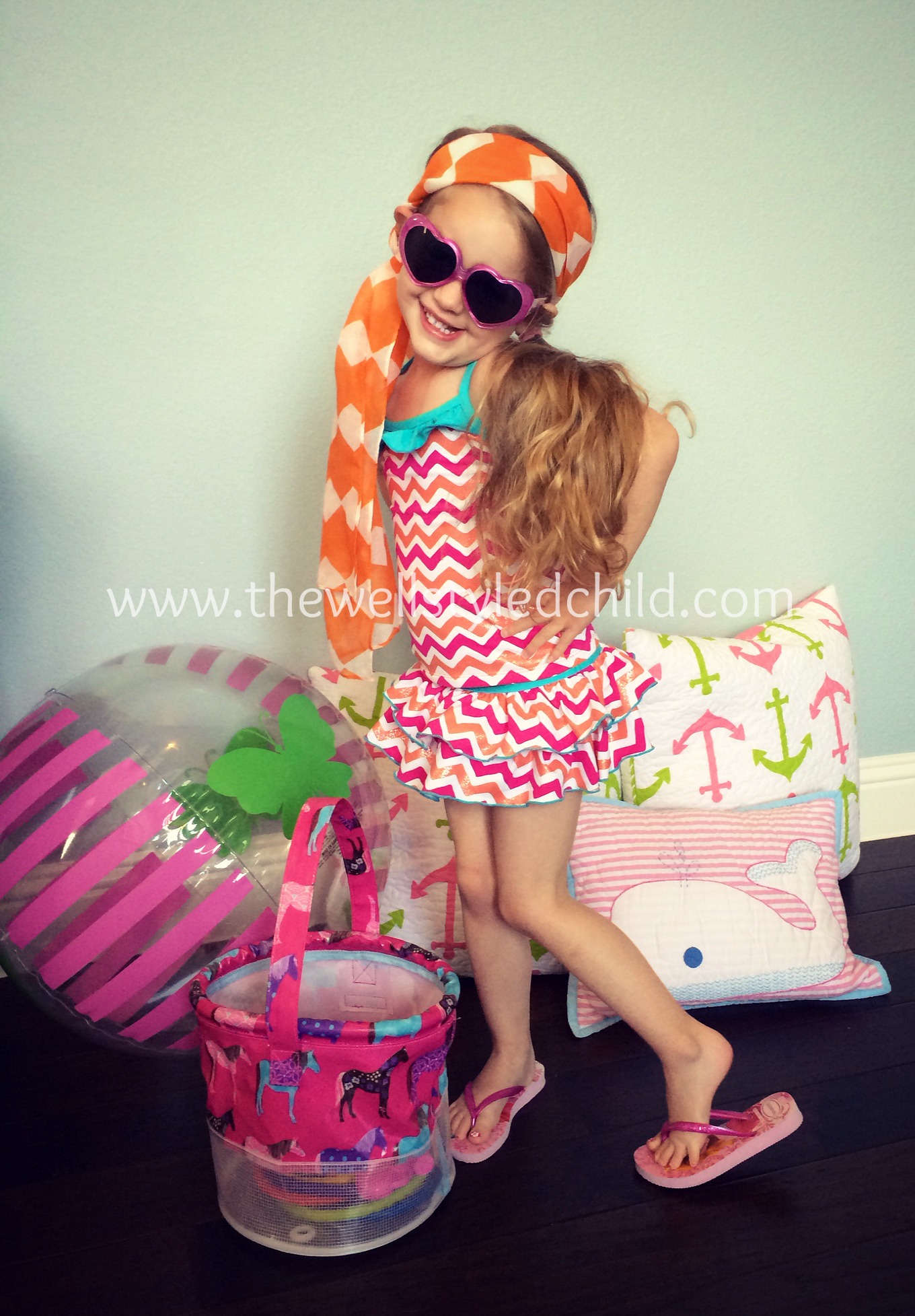 Garnet Hill Kids Ruffle Trim Tankini Top Garnet Hill Kids Skirted Swim Bottom Head Scarf: Target Sunglasses: Nordstorm Flip Flops: Havaianas Disney for Nordstrom Garnet Hill Kids Swim Bucket 