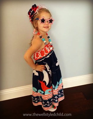 Here we are wearing it for year #2! I might make her wear it until she's 13 and it's just a top ;) 