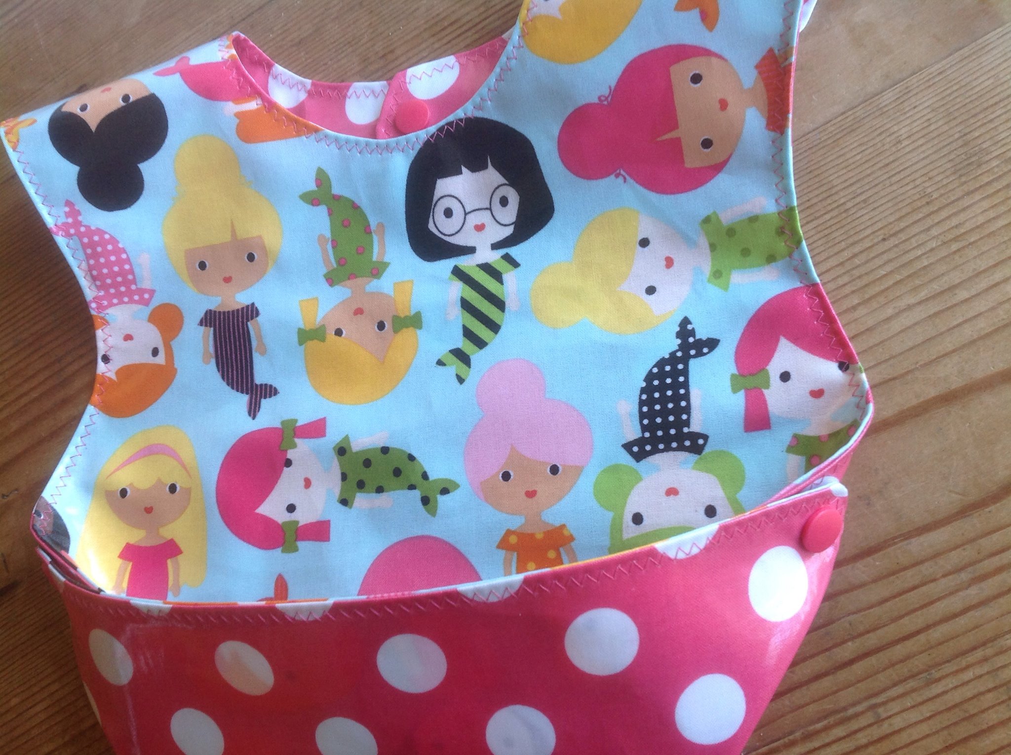 Holiday's personal favorite bib-- yes she still wears them with messy food-- have to protect those boutique clothes! 