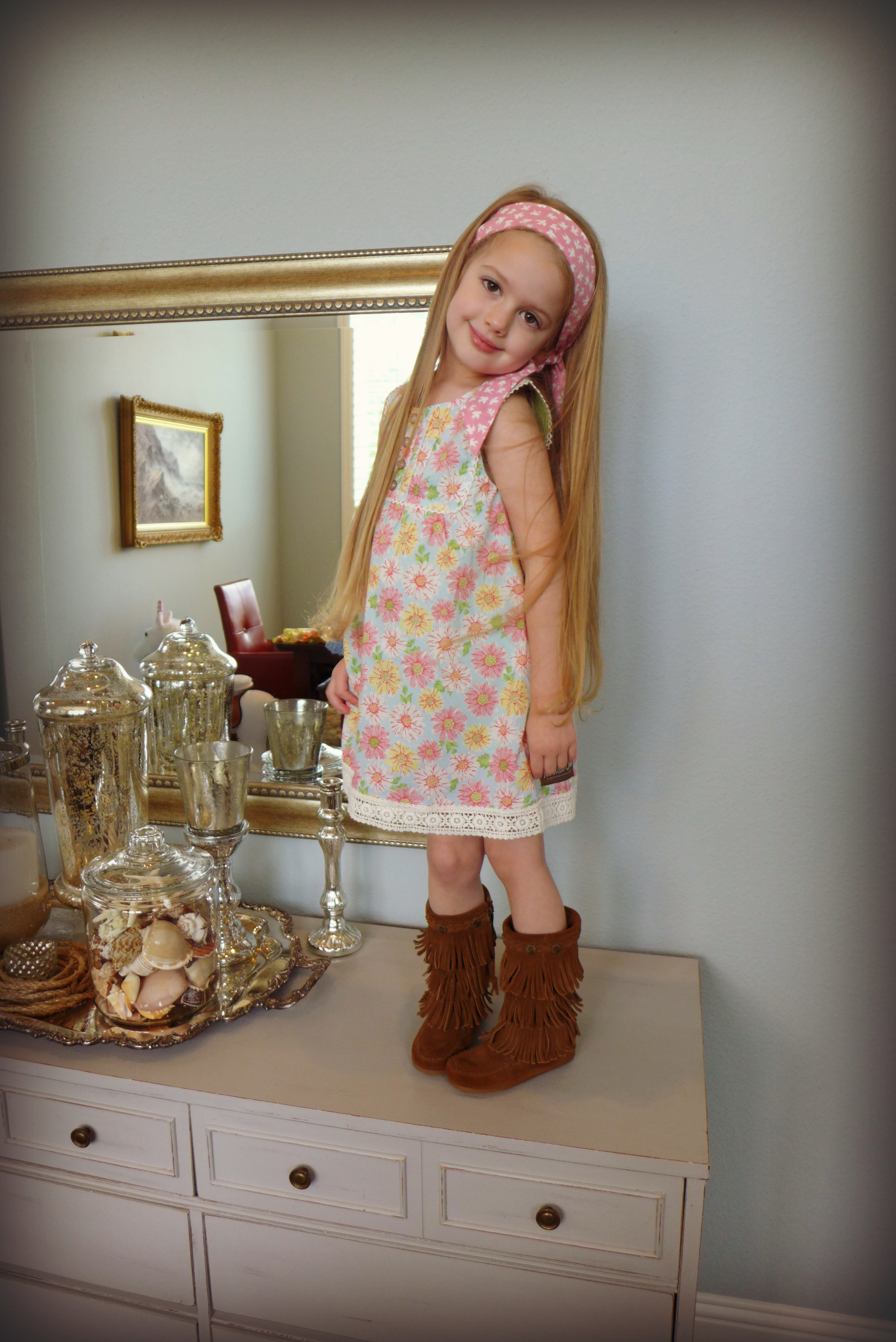 Holiday is also wearing a size 4 in this dress