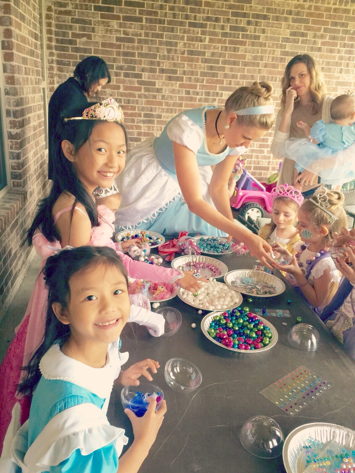 In spite or the nonstop downpours, we did a little craft project on the covered back patio that the girls got to take home! We made Christmas Palace Pets Christmas ornaments! Tutorial coming ASAP! 