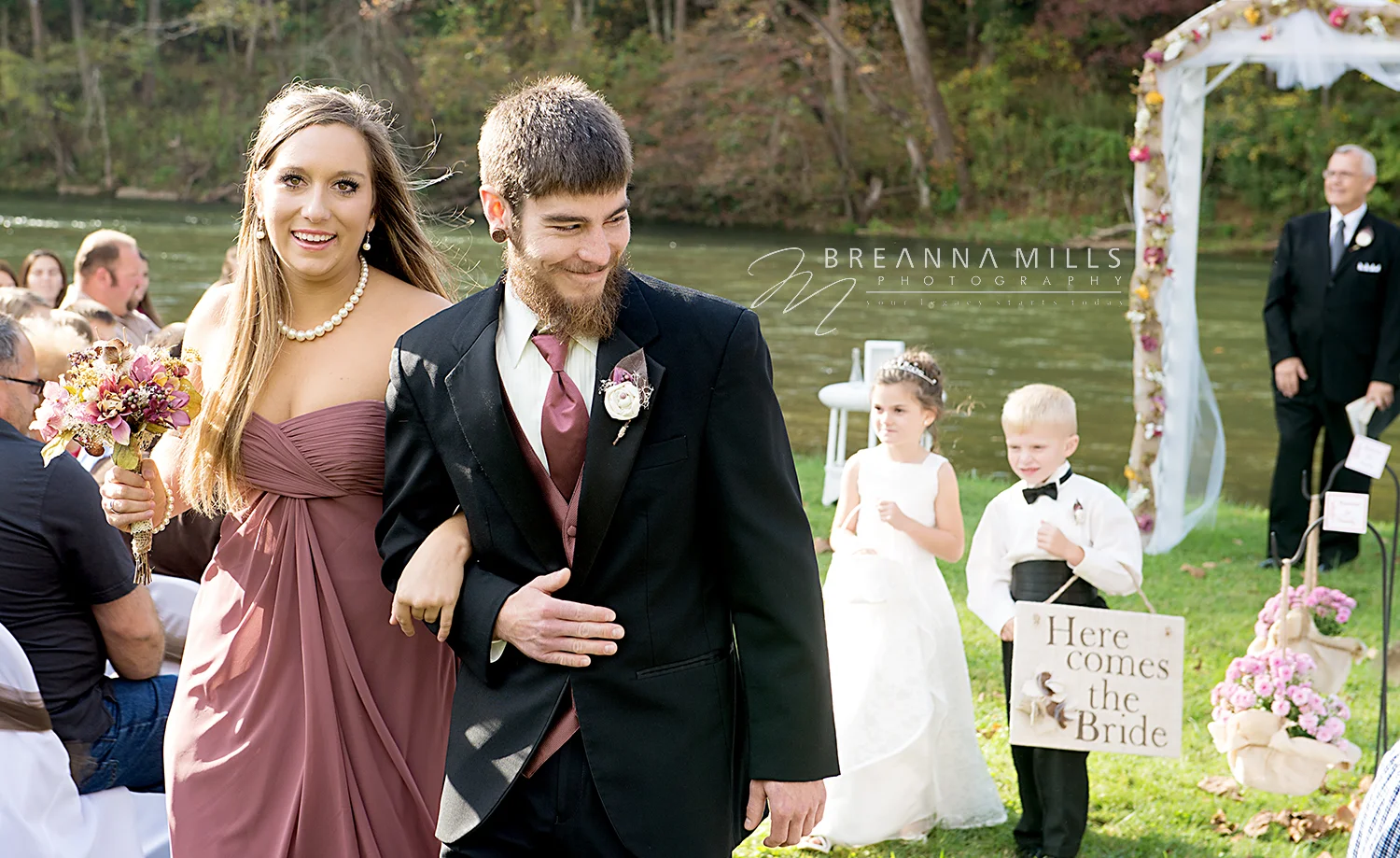 Johnson City wedding photographer, Breanna Mills Photography captured bridesmaid and groomsman during wedding ceremony. 