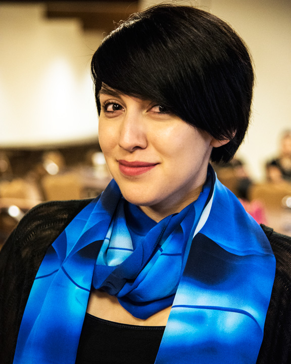 Help me identify this beautiful model wearing " Deep Blue Sapphire " from the Winter Gems Collection.