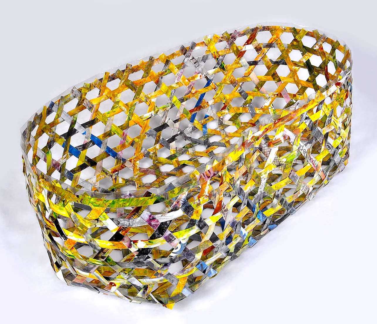 Alternative Duyan , 2011. Acrylic, & gel image transfers on acetate (woven together), 20" x 34" x 14" 