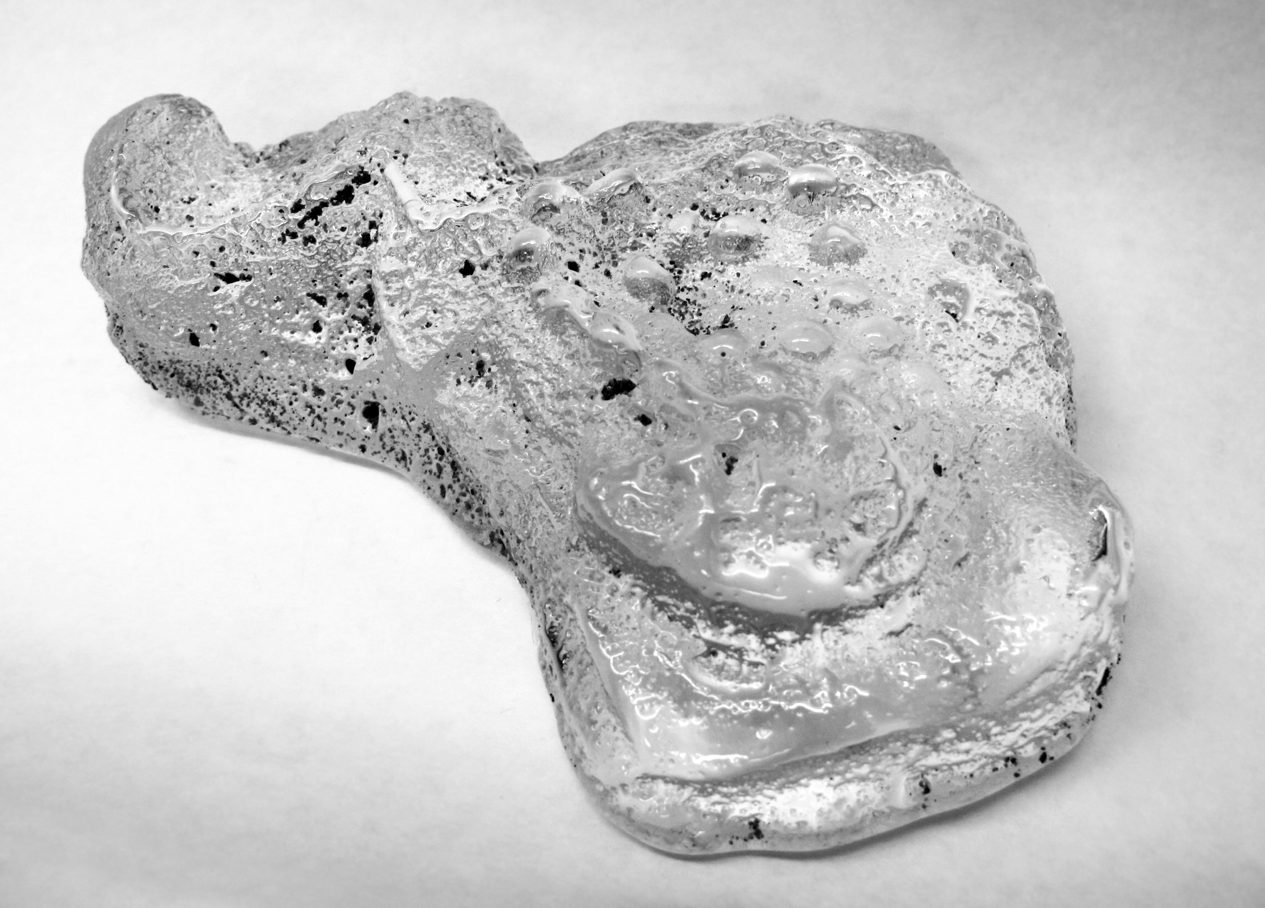   Character Nga , 2013.&nbsp;Sand casted glass,&nbsp; approx. 7" x 4" x 1.5"  