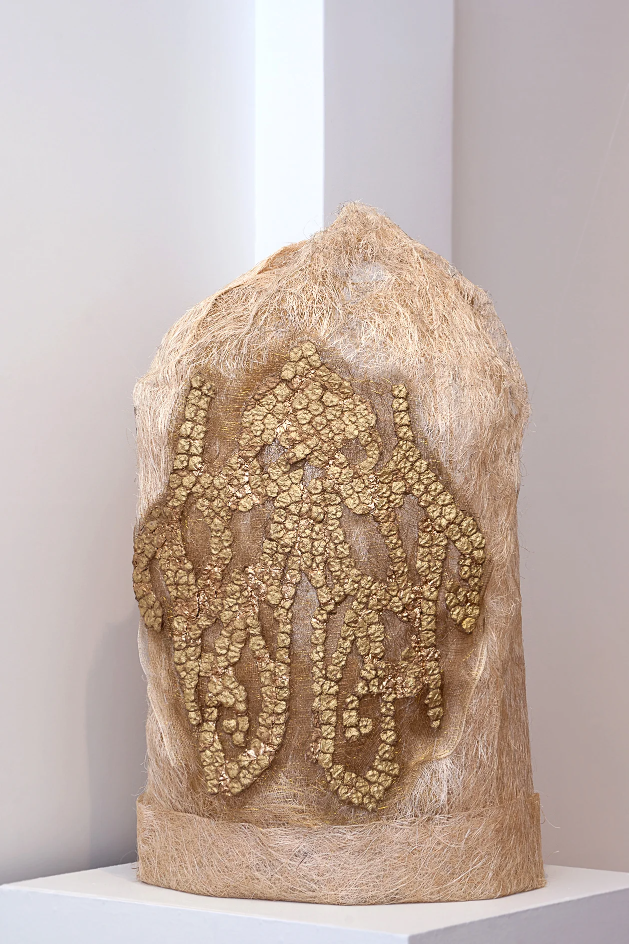 After Maria Clara's Piña Fiber Sleeve , 2014. Abaca fiber & spray paint on abaca pulp cast, 48" x 26" x 18" (Photo: Mido Lee)