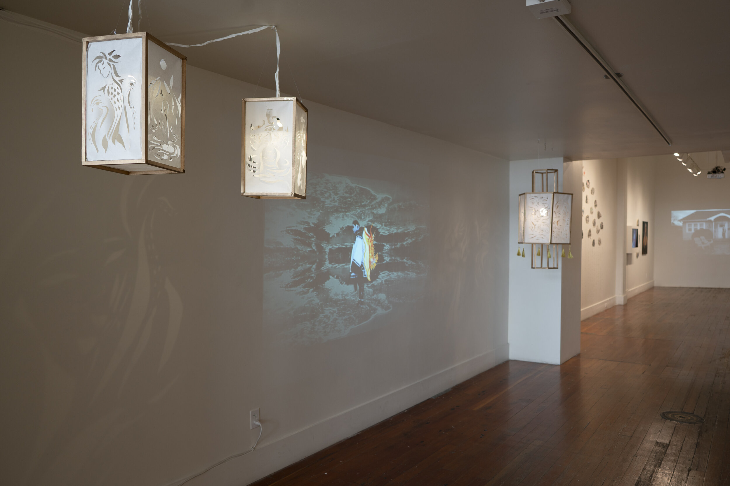   Kristiana Chan with missTANGQ  -  Inherited Luminescence , 2018. Wood and paper-cut lanterns, multimedia video and audio 