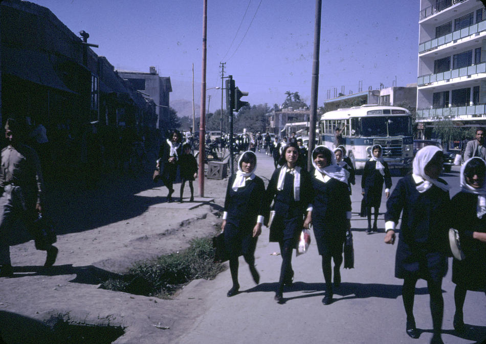 Afghan girls coming home from school.