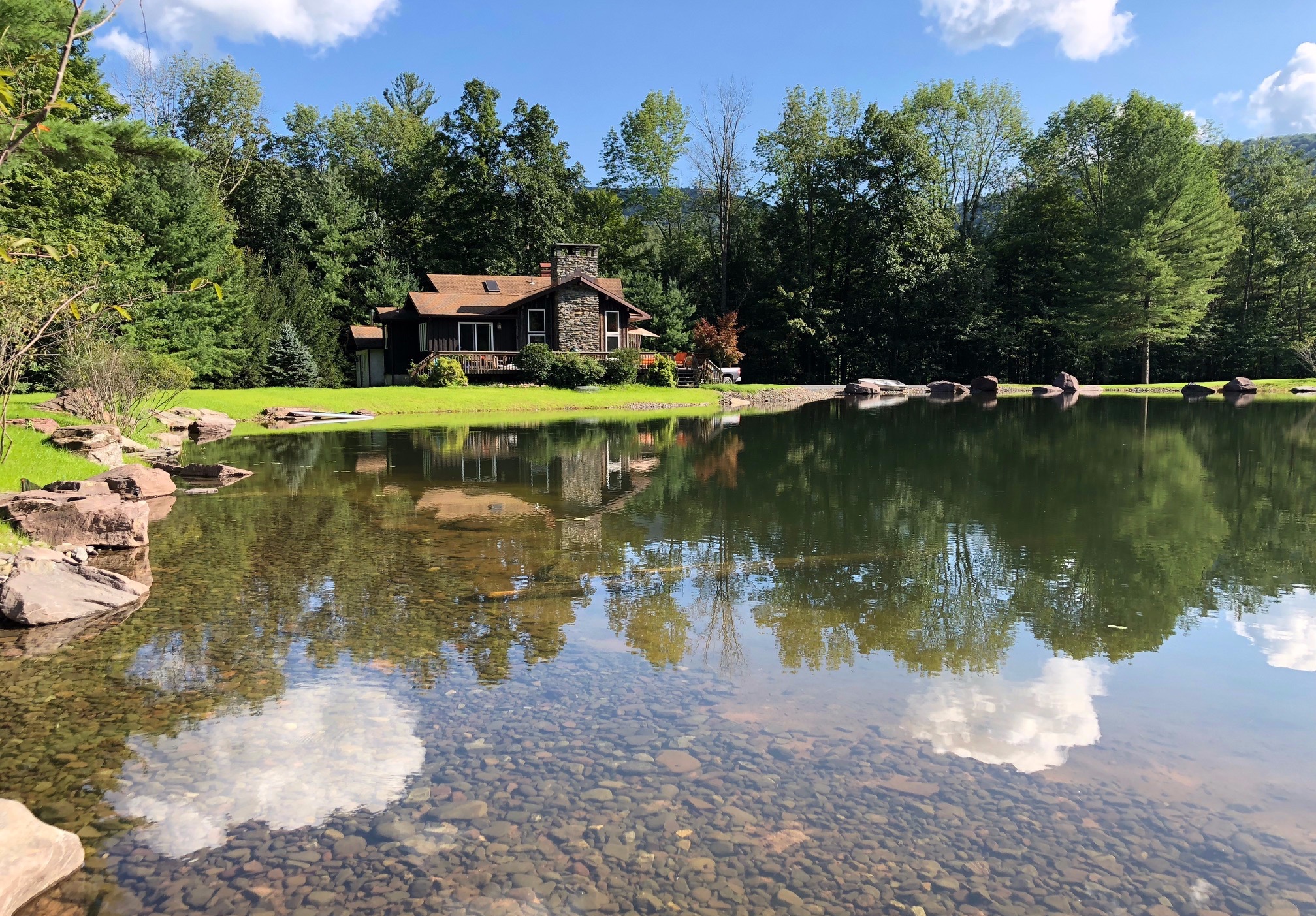 Sleepy Pines Exterior and Pond.jpeg