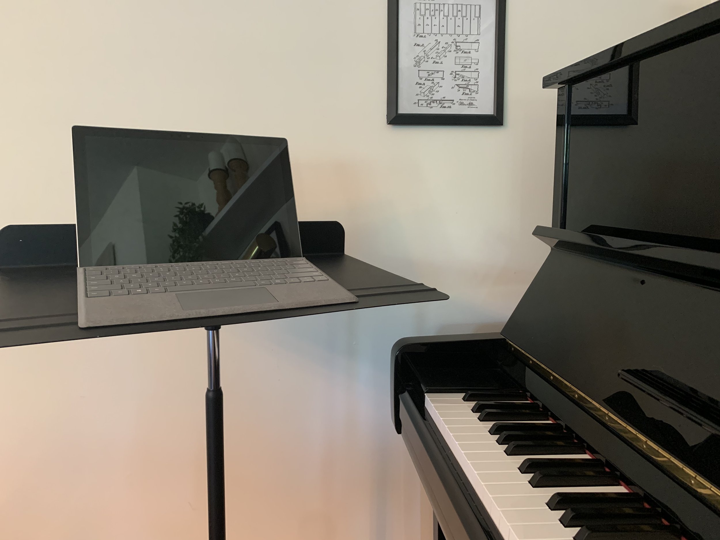 Online Piano Lessosn Setup with a Laptop, a Piano Keyboard and a