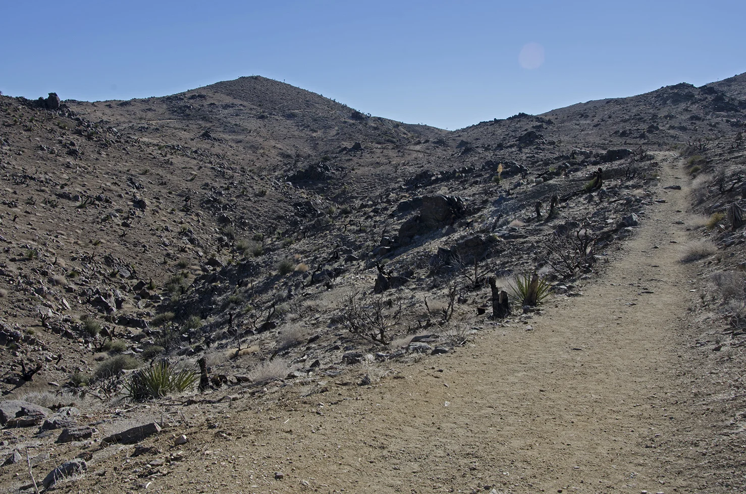 See the tailing pile to the left side of the road?