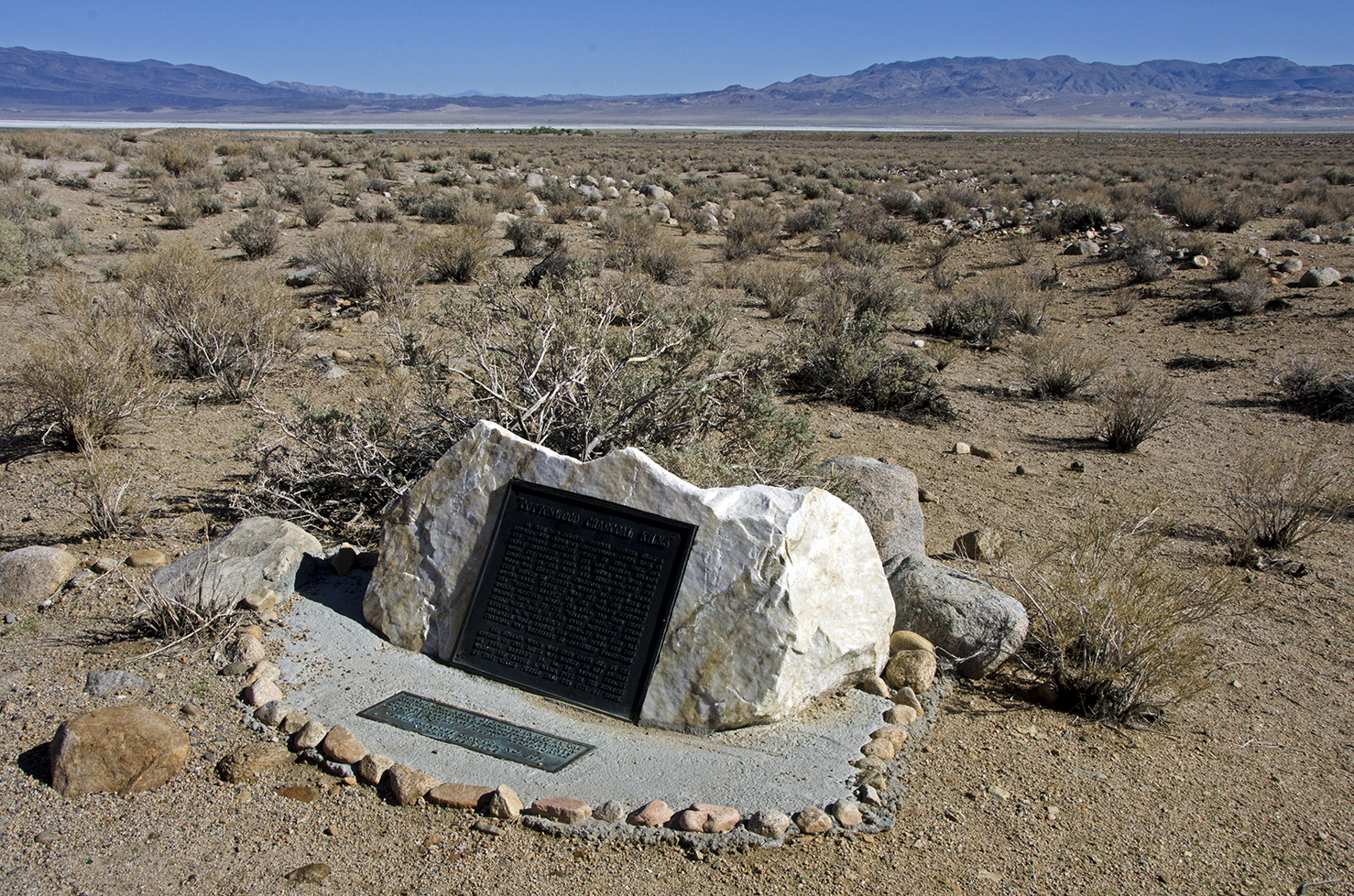 Cottonwood Charcoal Kilns Monument. Dry Owens Lake Bed in the distance.