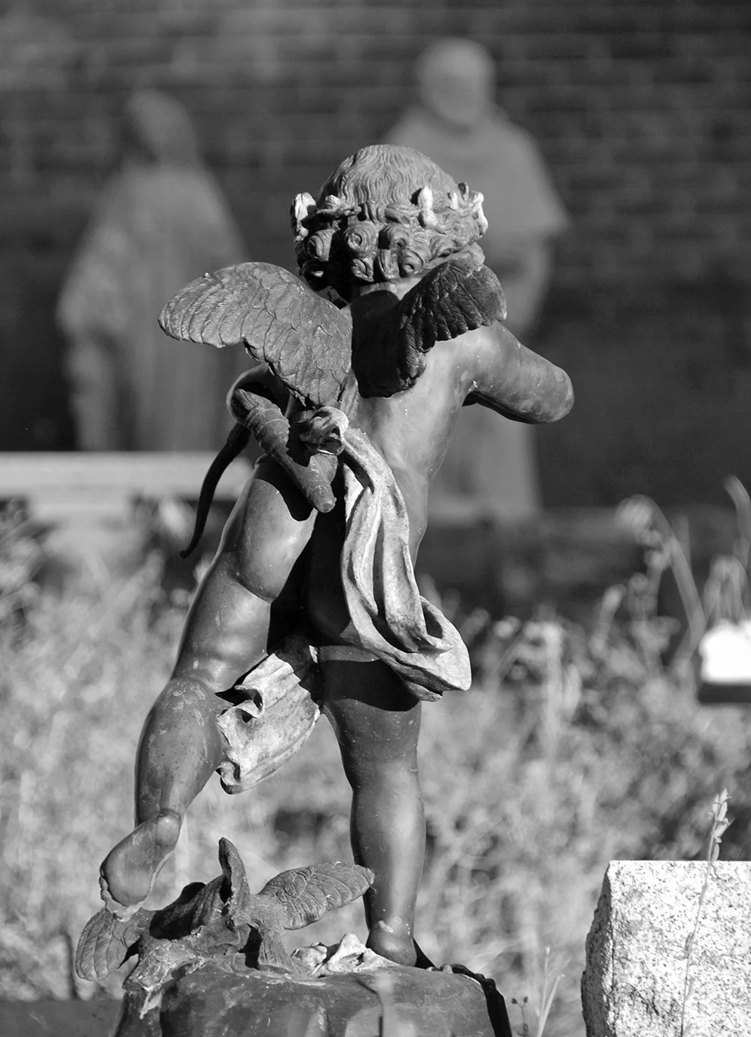 Columbia St. Annes Catholic Church Cemetery Winged Cupid.jpg