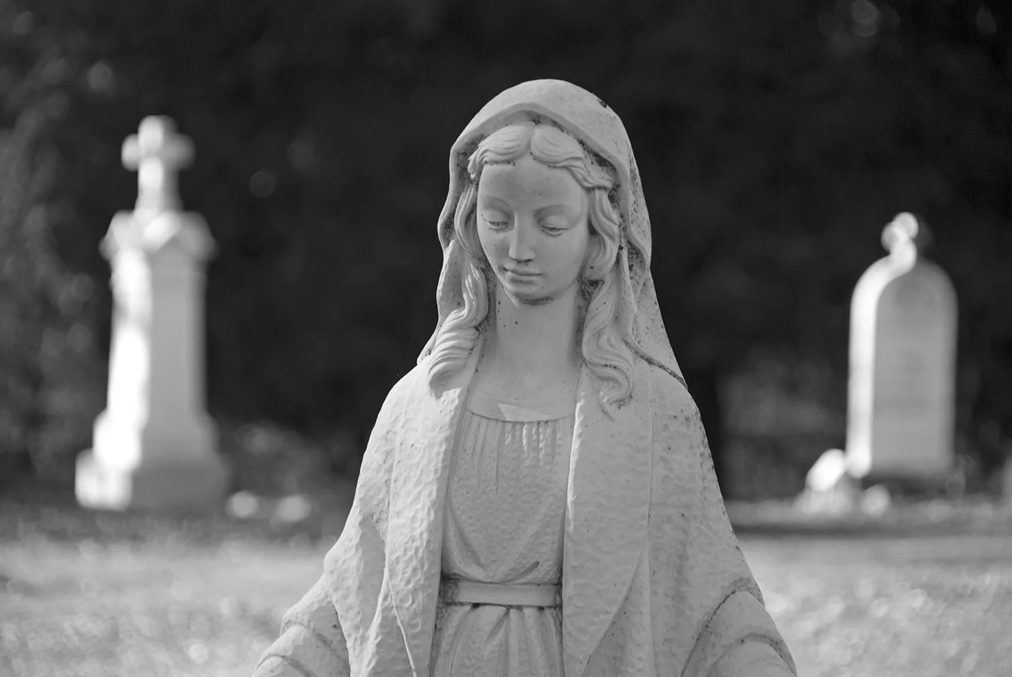 Mariposa St. Josephs Catholic Cemetery Lady and stones.jpg