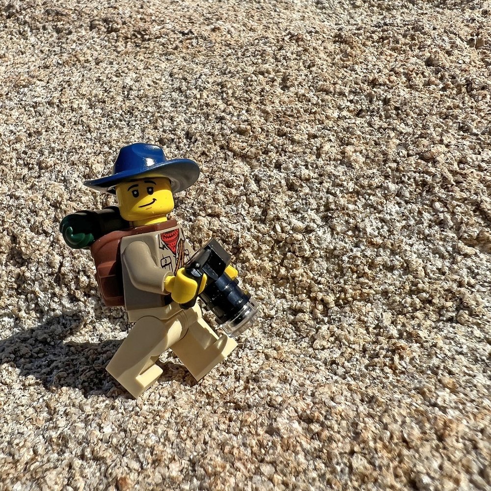 Exploratographer out on a hike.
.
.
.
.
.
#lego #afol #legominifigures #minifigs #minifigures #exploratography #toyphotography #legograms #joshuatreenationalpark #jtnp #dayhike #sip #iphone13pro #iphonetoyphotography #toyphoto #quartzmonzanite #every