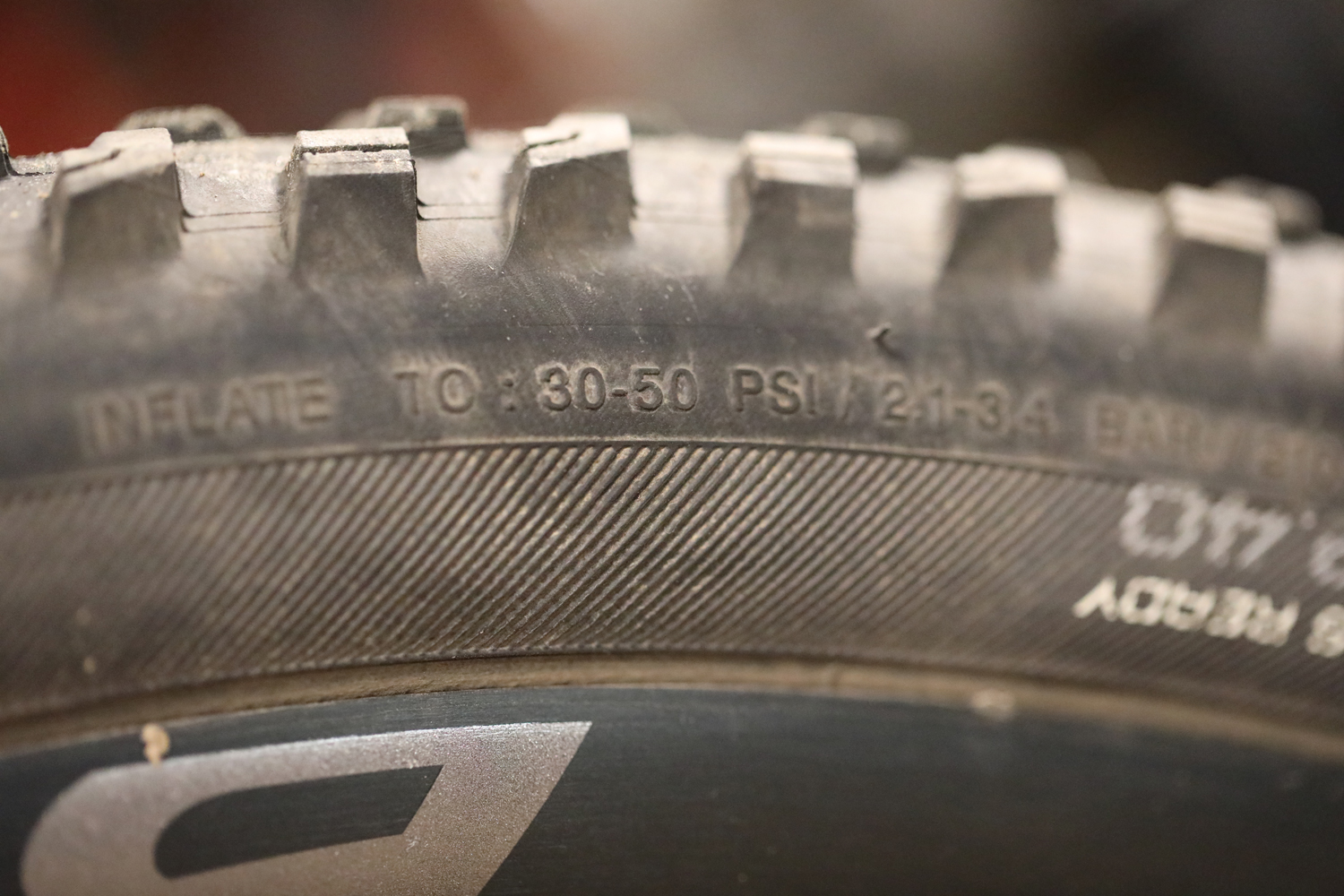 For this tire, the acceptable pressure range is 30-50 psi. It’s helpful to have a pump with a dial at home.