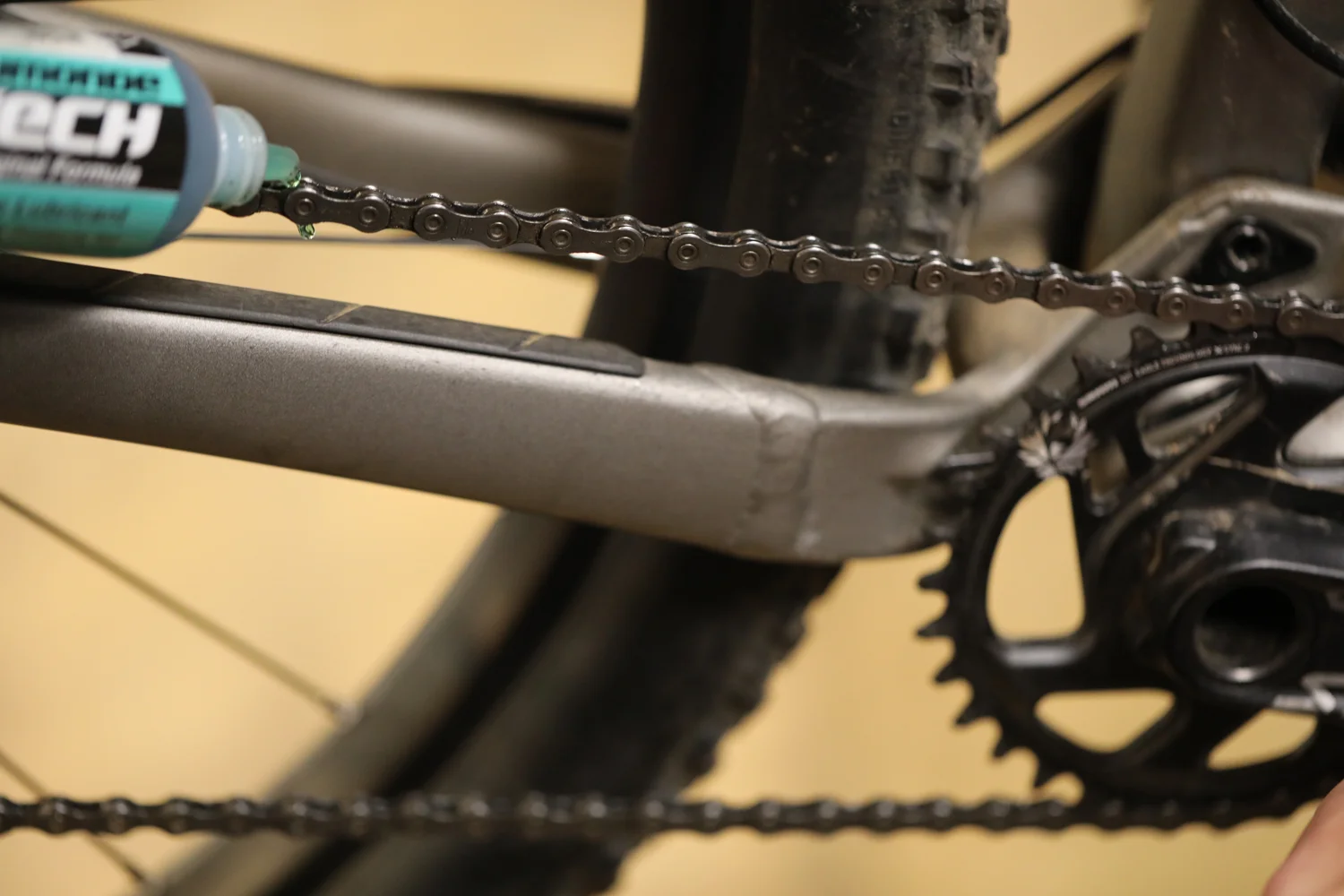 To apply chain lube, backpedal while applying a thin stream to one revolution of chain.