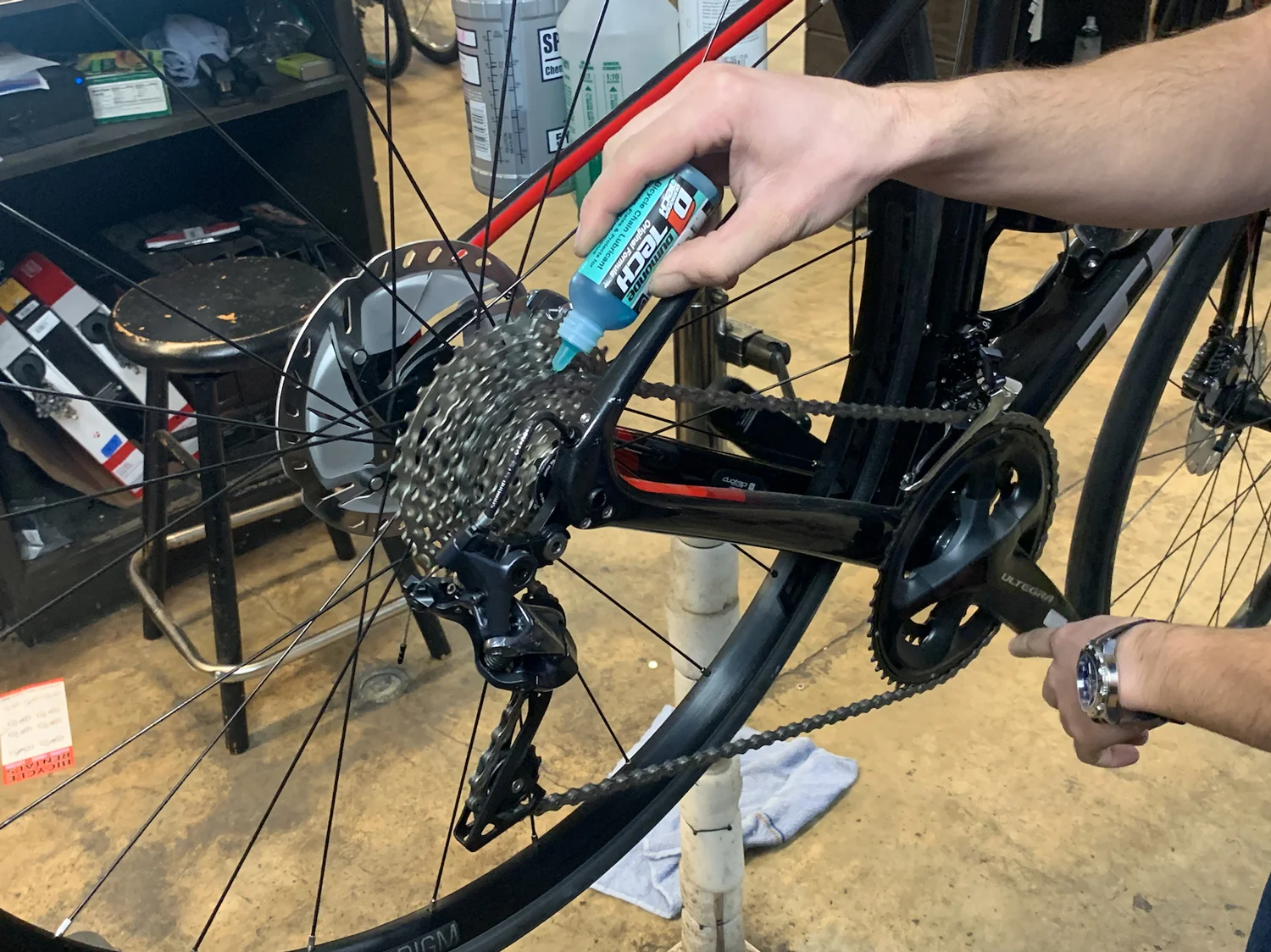 To apply chain lube, backpedal while applying a thin stream to one revolution of chain.