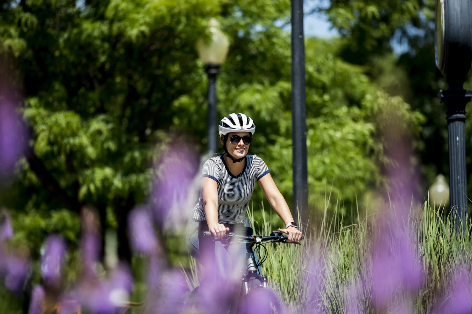 The money saved by opting for an e-bike is definitely something to smile about. (Trek Dual Sport+ pictured.)