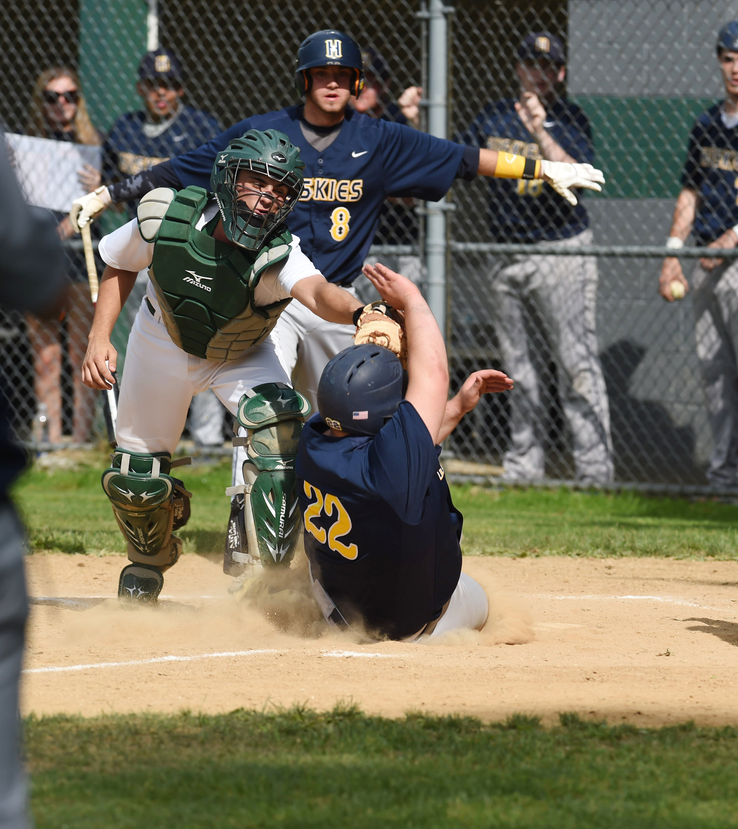  5/23/2016 - Poughkeepsie, NY - Spackenkill's Joe Arcuri, left, tags out Highland's Frank Alfonso, right, at home plate during Monday's game.&nbsp; 