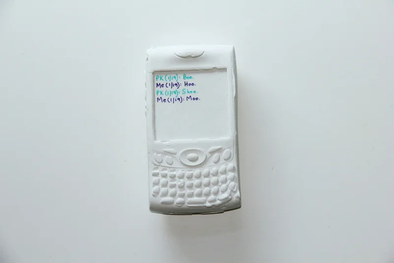For A Good Time, Text PK. Plaster cast cell phone. Dimensions very. 2011