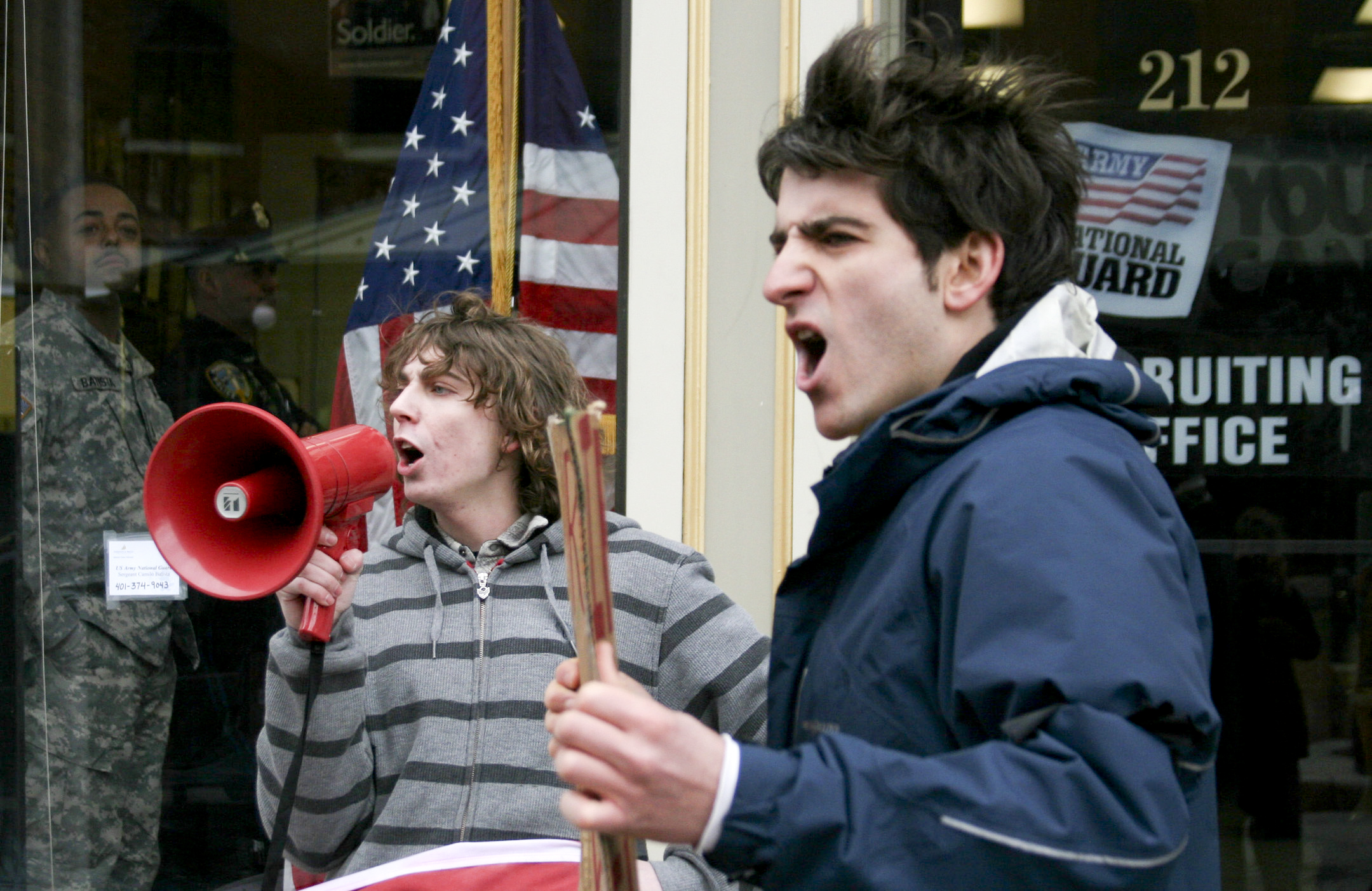  College students protest recruiting practices of a US military recruiting office in Providence, RI. 
