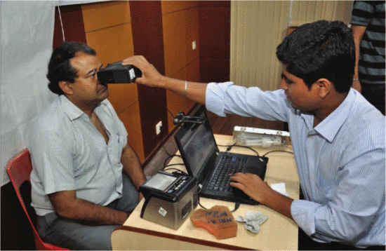 Figure 4. A biometric data collection camp of the aadhaar project of the Unique Identification Authority of India (UDAI), Government of India, Salt Lake, Kolkata. (Courtesy of Biswarup Ganguly.)