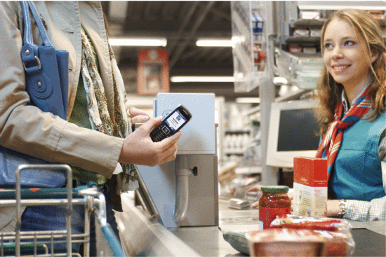 Fig. 7. Purchasing grocery items effortlessly by using the near-field communication (NFC) capability on your 3G smartphone. Courtesy of NXP Semiconductors 2009.