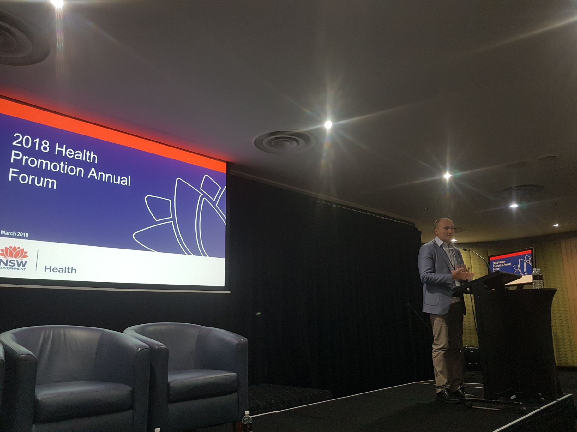 Mr Paul Klarenaar introducing the Panel on Contemporary and Future Approaches to Health Promotion. He is the Director of the NSLHD (Northern Sydney Local Health District) Health Promotion. Paul is very future focused and does not hesitate to assess current and future modes of operation as they pertain to the community at large.