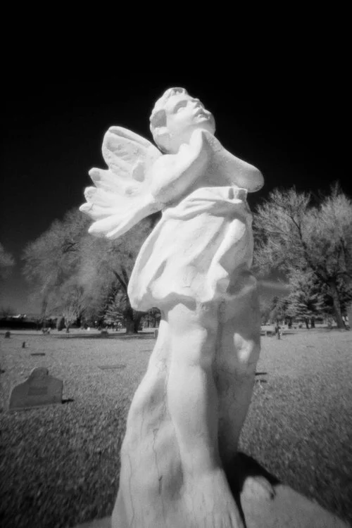 StatueRosaryCemeterySantaFeNM8x10inchesPhotographyCodyBrothers.jpeg