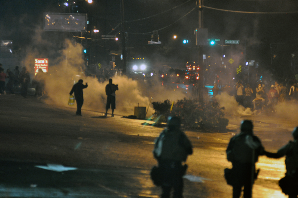 Police responded to Ferguson protests with tear gas, rubber bullets, smoke bombs and bean bag rounds over the nights of the 12 & 13 August, 2014. Photo: Loavesofbread.