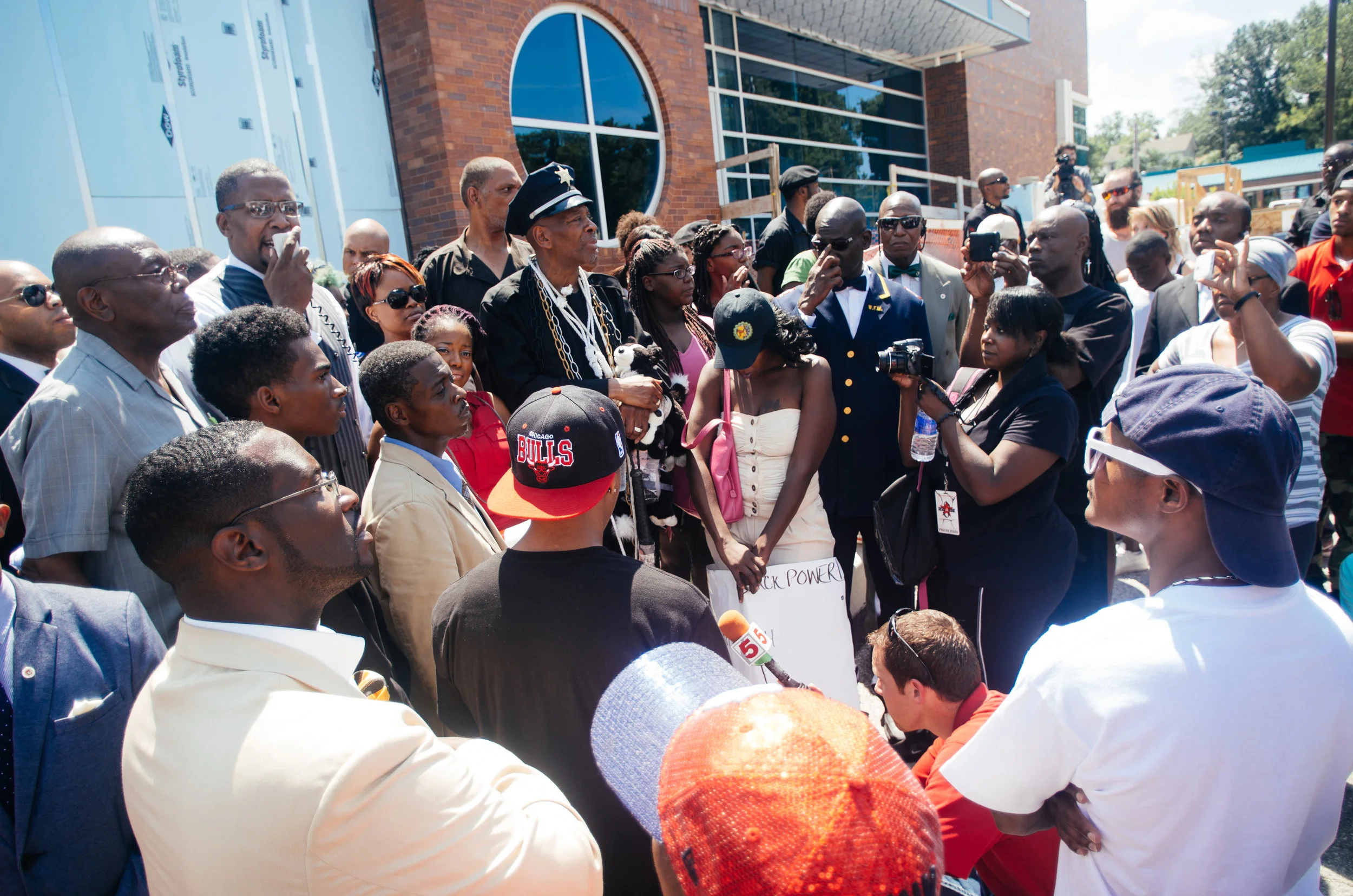 Protestors gather outside the Ferguson Police Department. Photo: Jamelle Bouie.