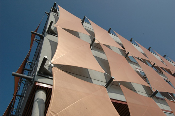 Hyparform vertical sails on a Vienna building by Planex