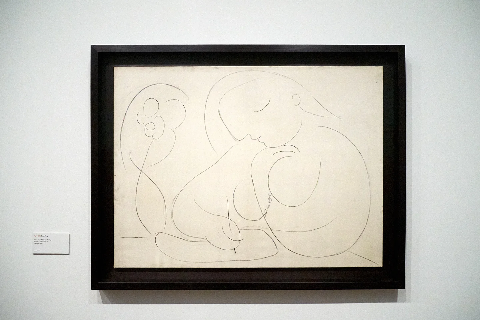 Pablo Picasso — Femme à la fleur, écrivant , 1932